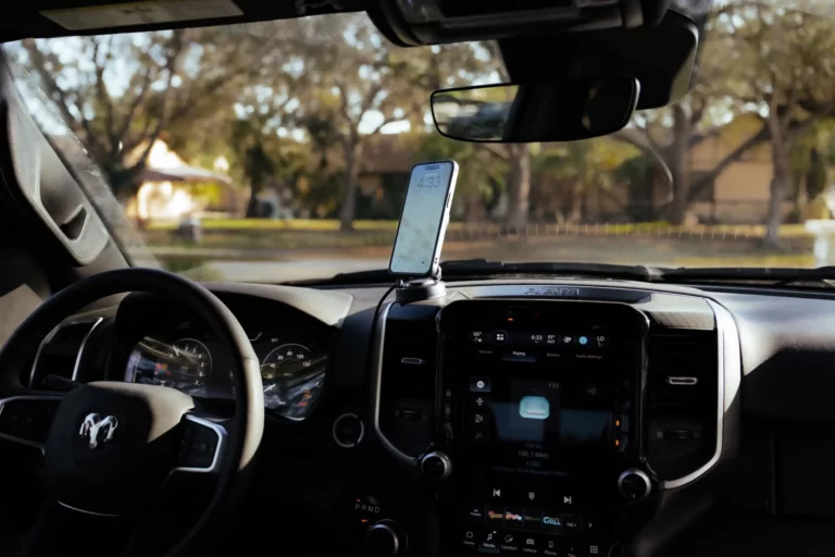 Phone secured in a car mount while driving on a rough road